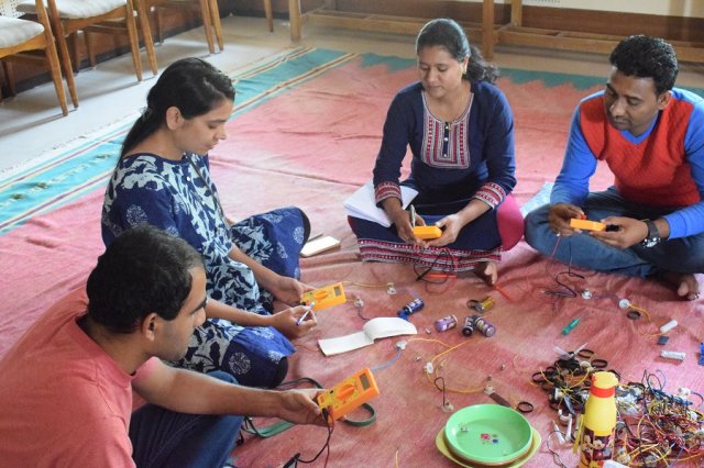 Team of Electricity &amp; Magnetism preparing for their session.
